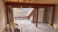 Structural steel frame for a loft conversion above an urban terrace